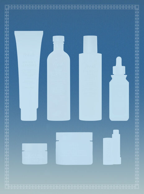 Light blue silhouettes of 7 fresh beauty products on a dark blue background