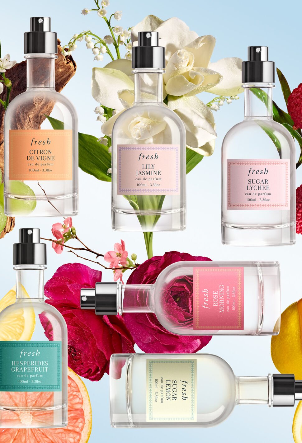 Six Fresh perfume bottles floating against a floral background